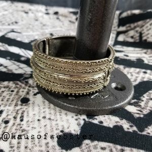 Silver metalwork hinge bangle bracelet